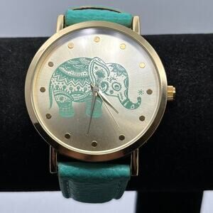 Gold elephant watch